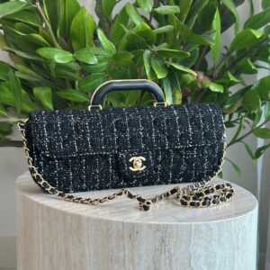 Chanel Bag Is A Structured Black Tweed Piece
