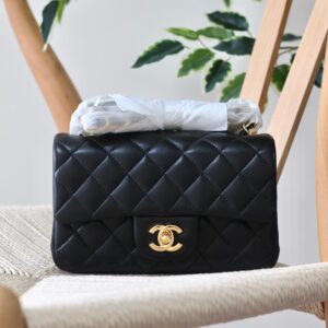 CHANEL Lambskin Quilted Mini Rectangular Flap Bag With Iconic Gold-Tone Hardware