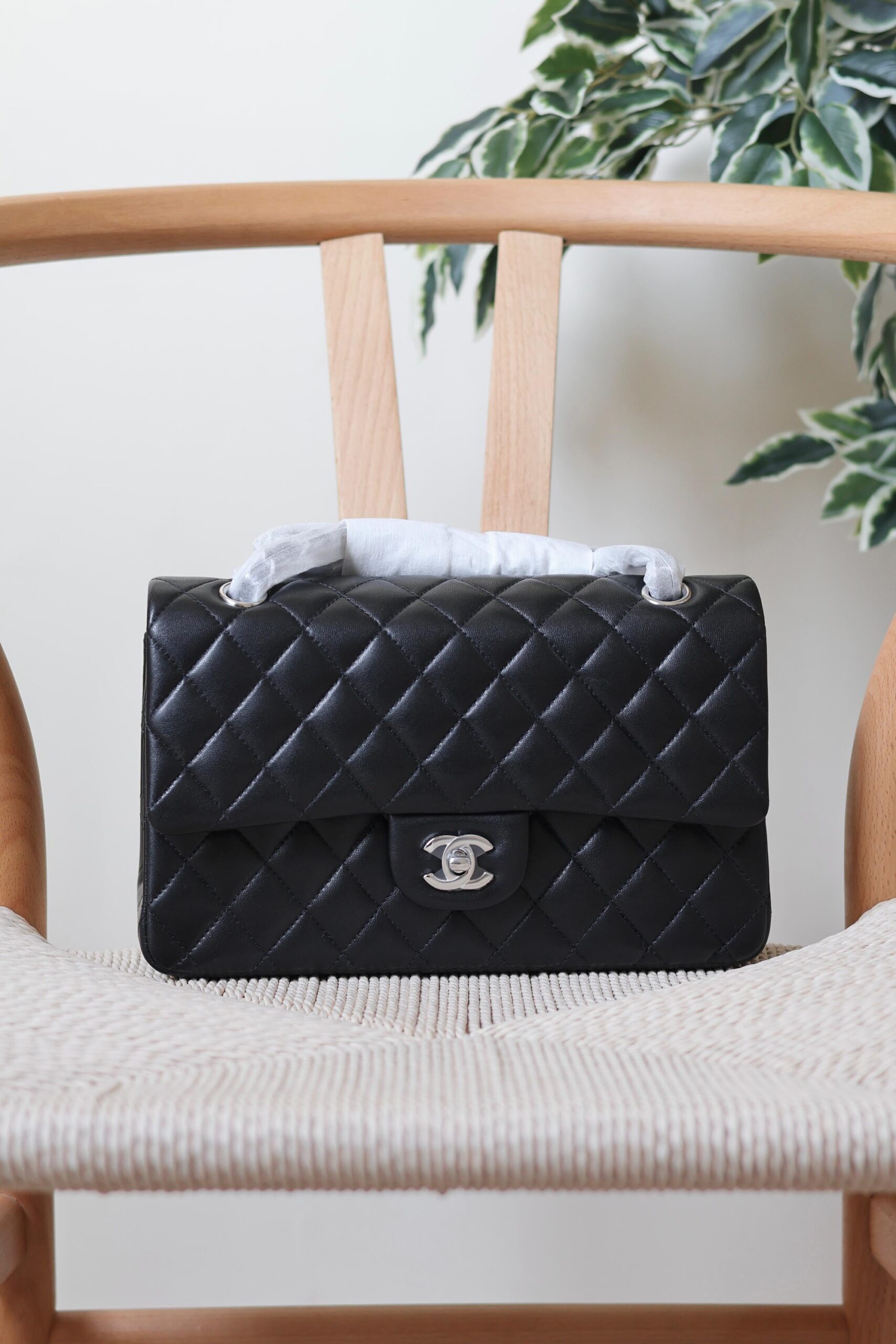 Chanel Classic 11.12 Flap Bag Featuring Quilted Lambskin Leather