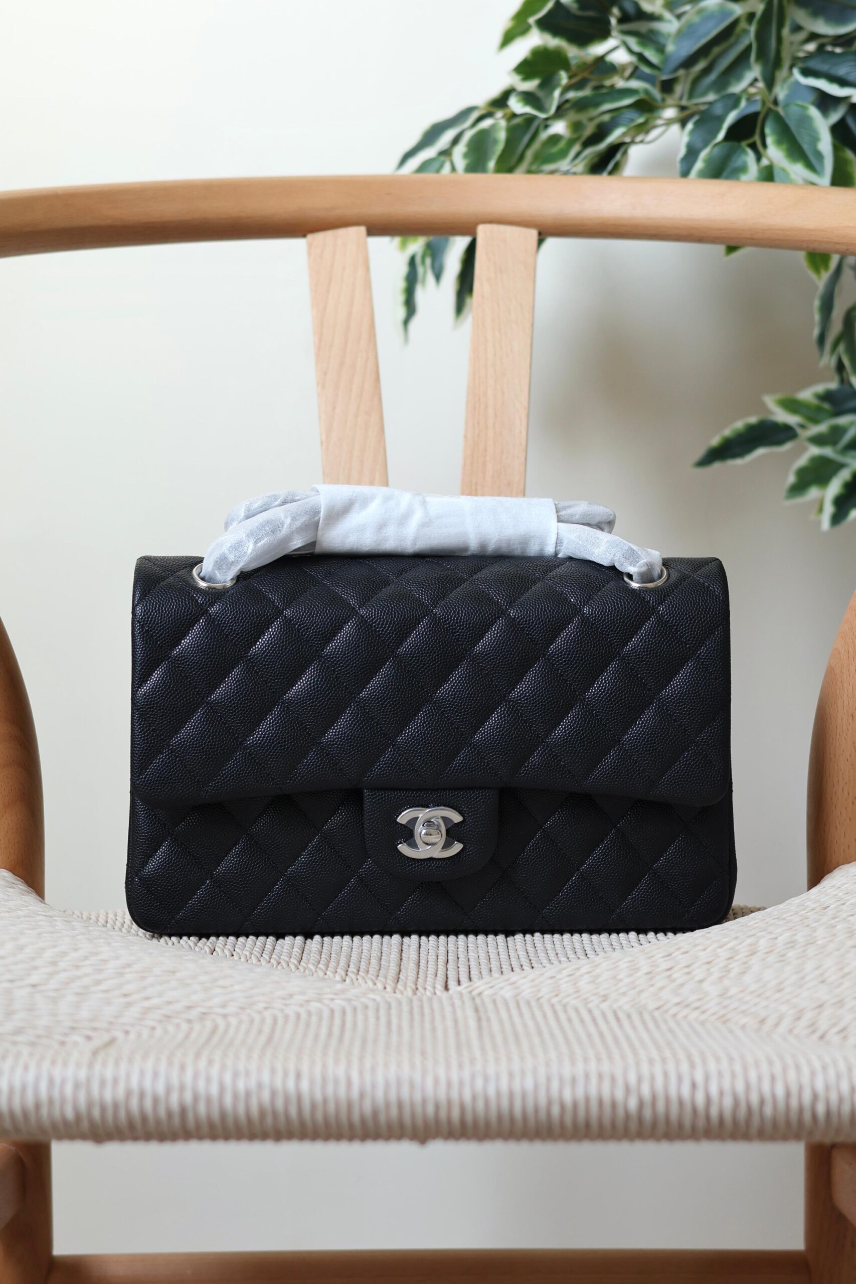 Chanel Classic Flap Bag Caviar Leather And Features A Silver Tone CC Turn-Lock - Image 18