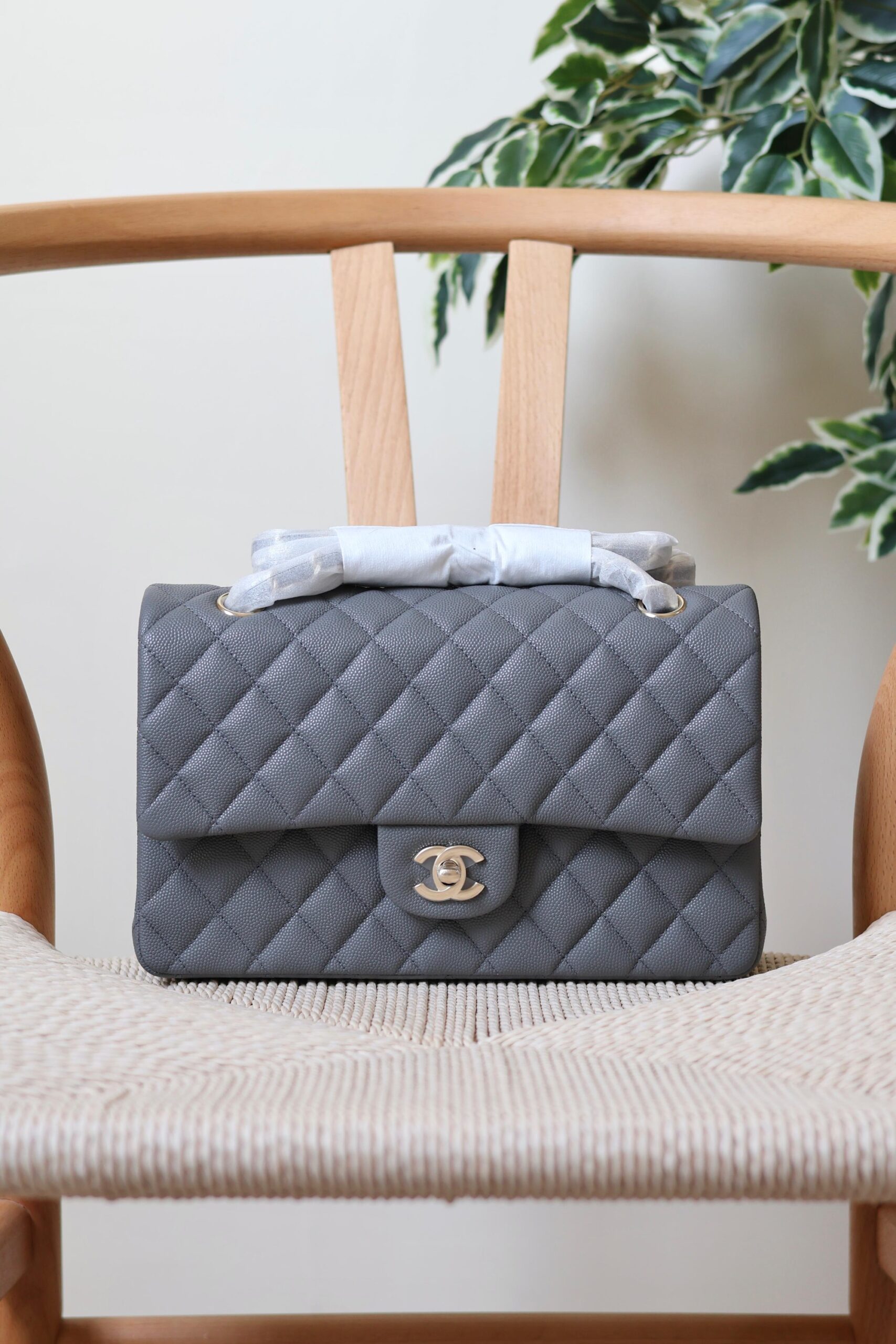 Chanel Classic Flap Bag Caviar Leather And Features A Silver Tone CC Turn-Lock - Image 6