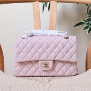 Chanel Classic Flap Bag Caviar Leather And Features A Silver Tone CC Turn-Lock