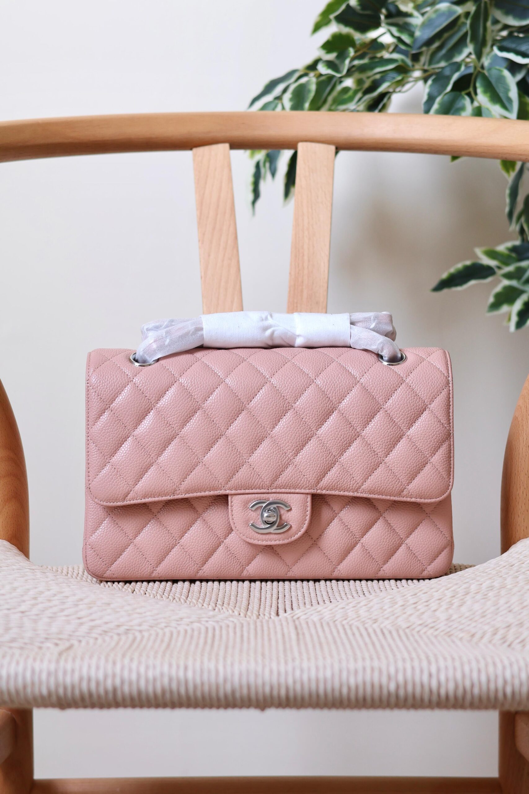 Chanel Classic Flap Bag Caviar Leather And Features A Silver Tone CC Turn-Lock - Image 11