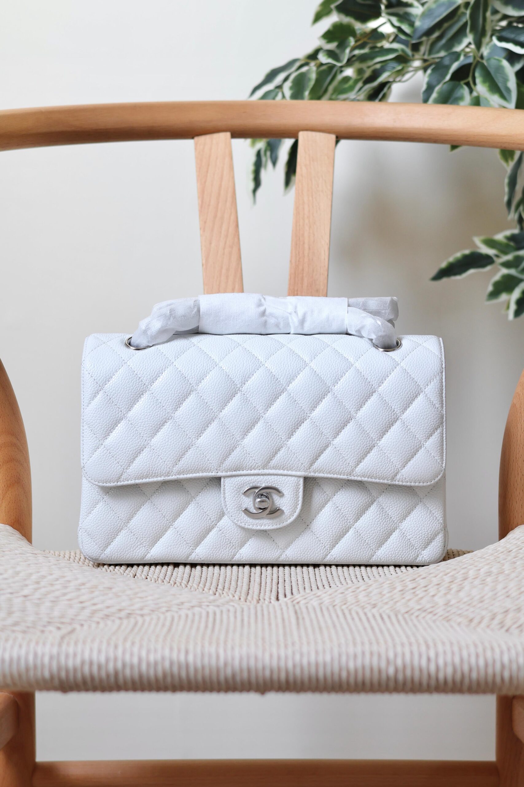 Chanel Classic Flap Bag Caviar Leather And Features A Silver Tone CC Turn-Lock - Image 14
