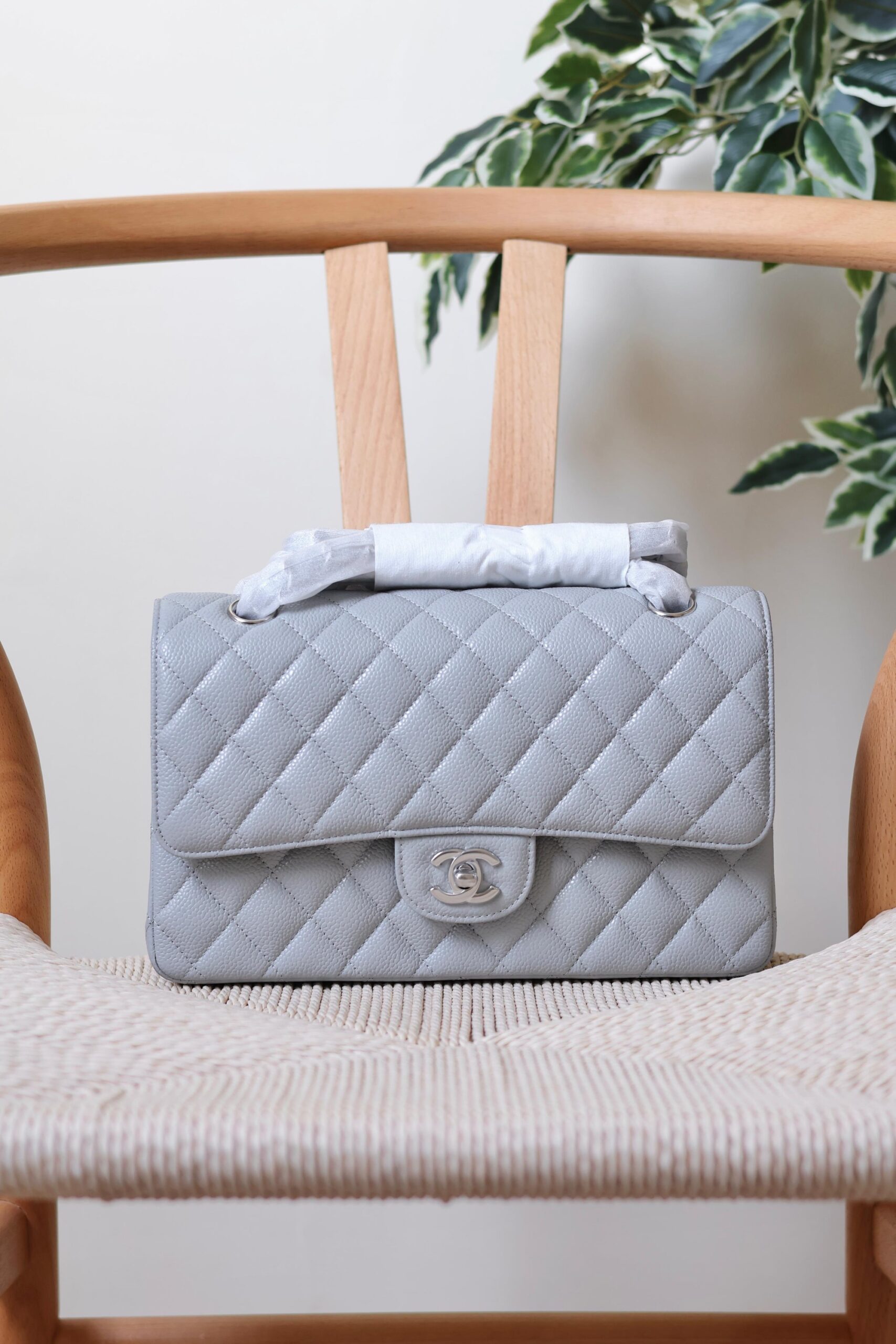 Chanel Classic Flap Bag Caviar Leather And Features A Silver Tone CC Turn-Lock - Image 10